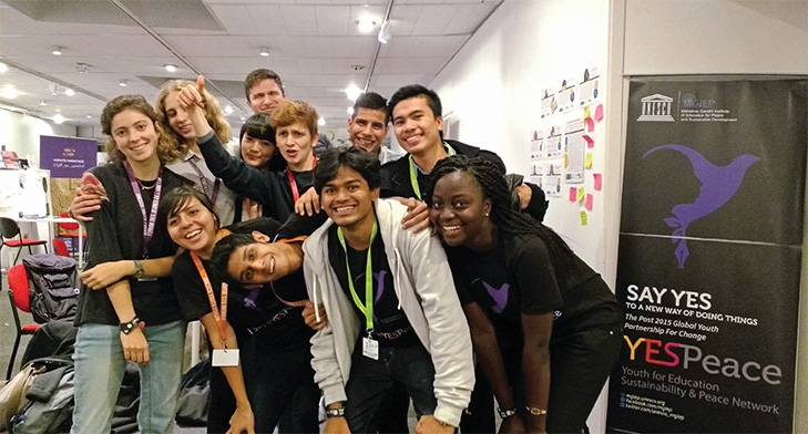 A group of volunteers for the ‘YES Peace’ programme pose for a picture.
